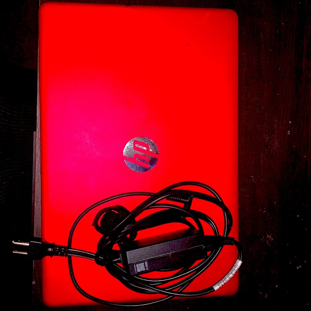 Red HP laptop, great condition, very stable battery life, and no viruses